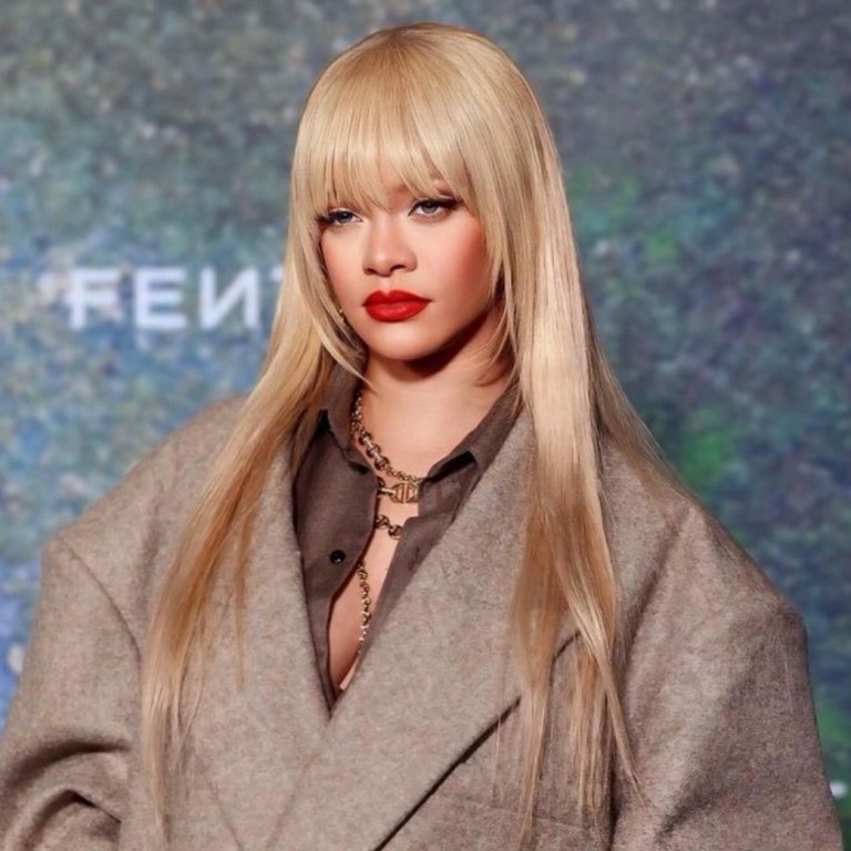 Rihanna’s Signature Style: Long Honey Blonde Hair and a Fenty Red Lip!